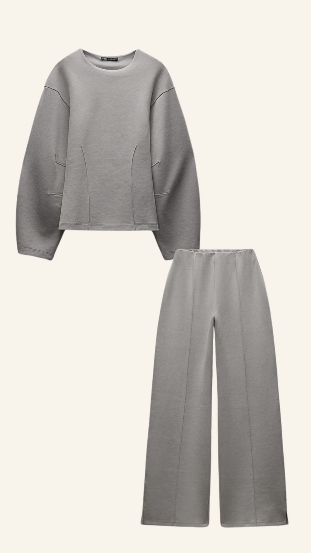 Structured two-piece set for women featuring a long-sleeve top and matching straight trousers, front view
