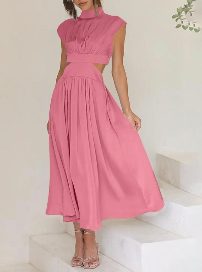 Long women's dress with high neck, waist-defining cut-out, and flowing full-length skirt