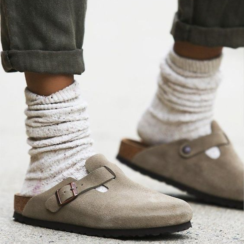Suede slippers with adjustable buckle strap and contoured footbed for everyday wear