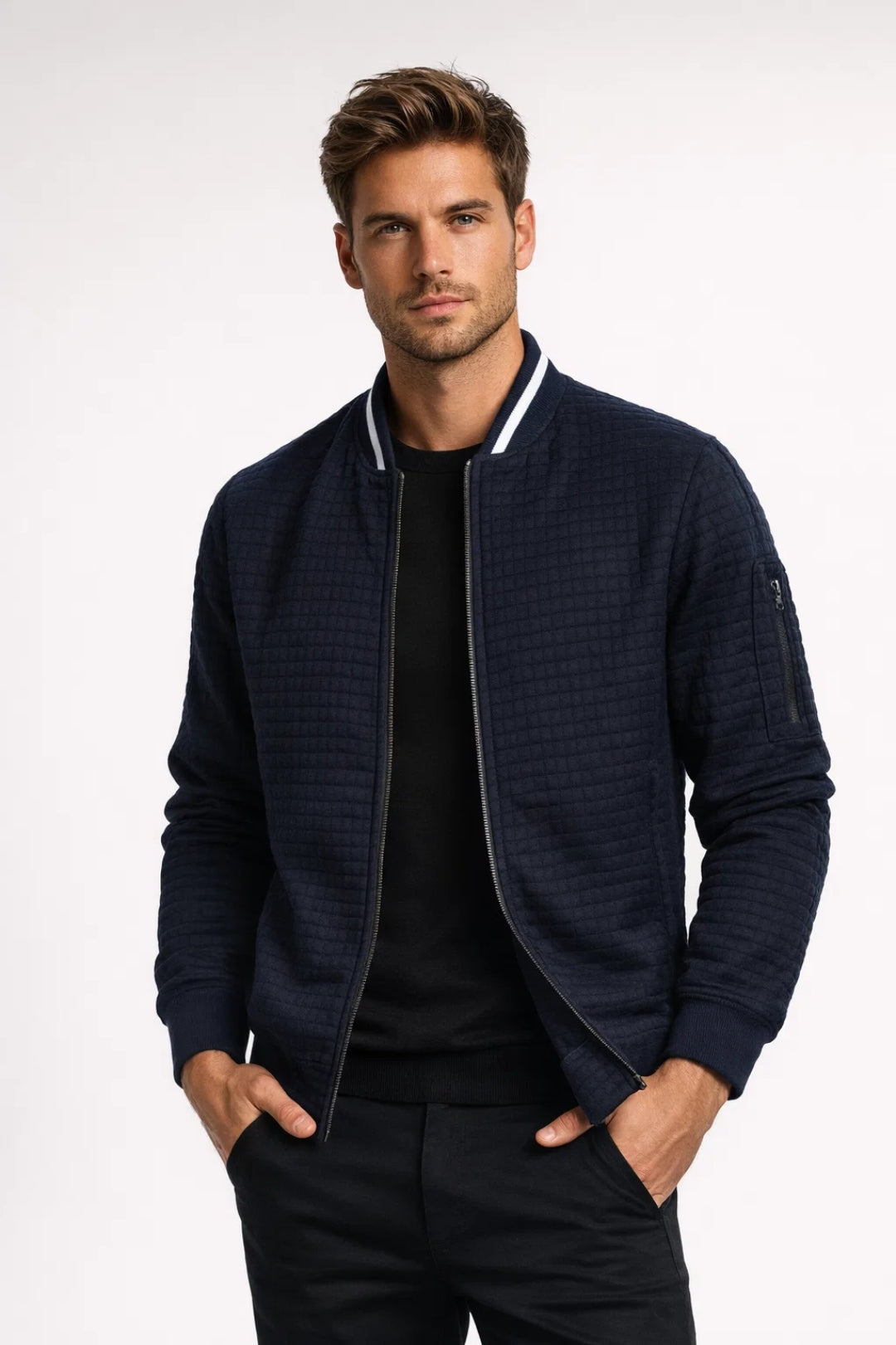 Men's quilted bomber jacket with ribbed collar, front zipper, and ribbed cuffs