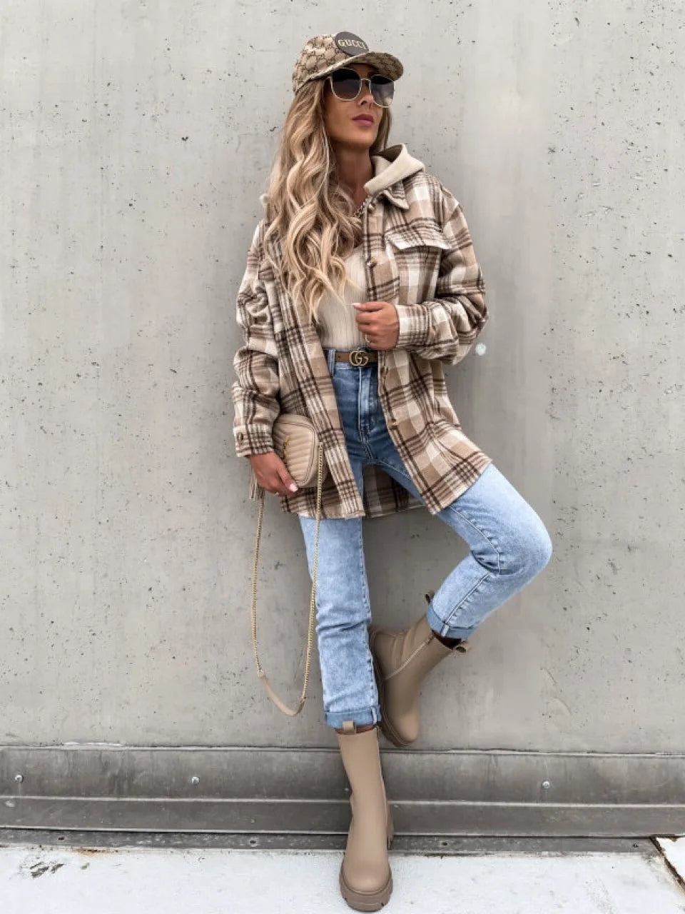 Women's plaid overshirt jacket back view, hip-length cut with woven plaid pattern