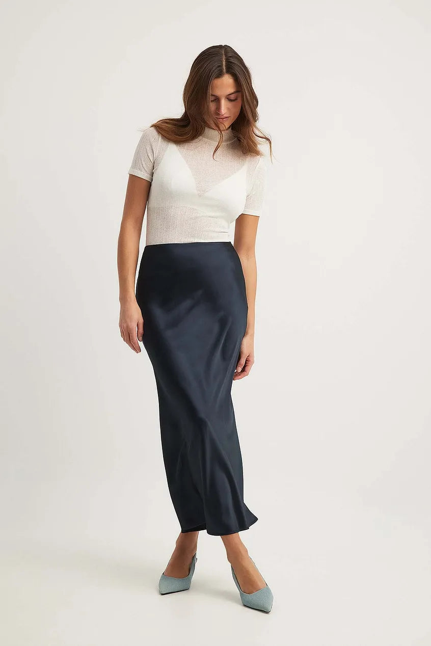 Women's pull-on satin midi skirt styled for everyday wear, full-length view
