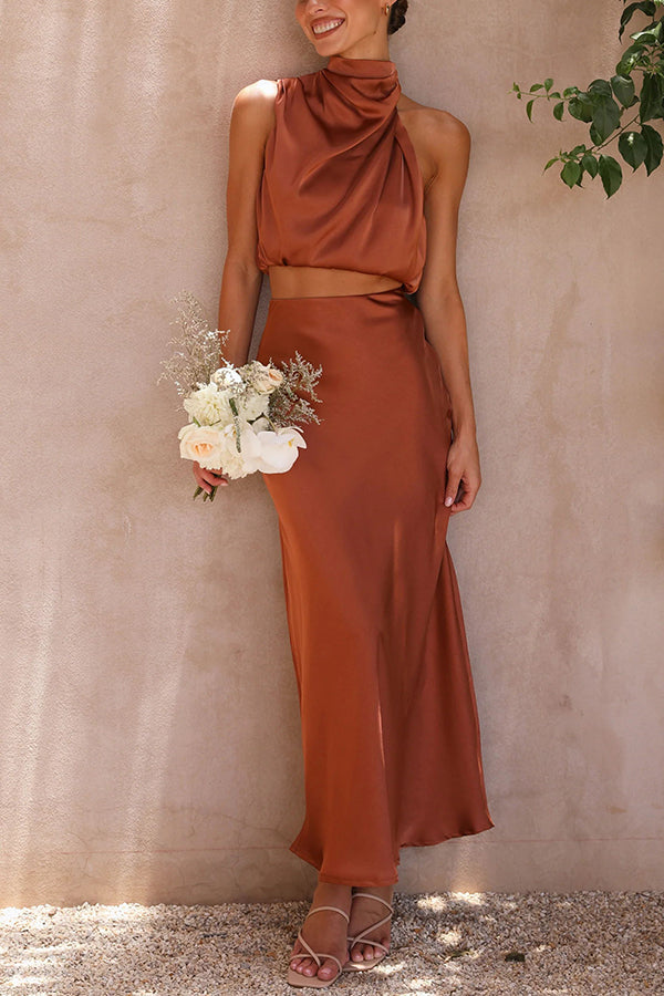 Women's halterneck satin two-piece set with draped front and straight-cut full-length skirt
