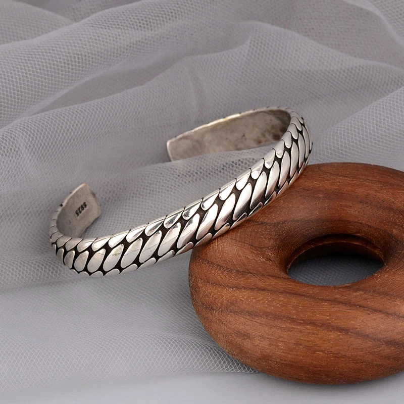 Adjustable open cuff bracelet with polished metal finish for everyday wear
