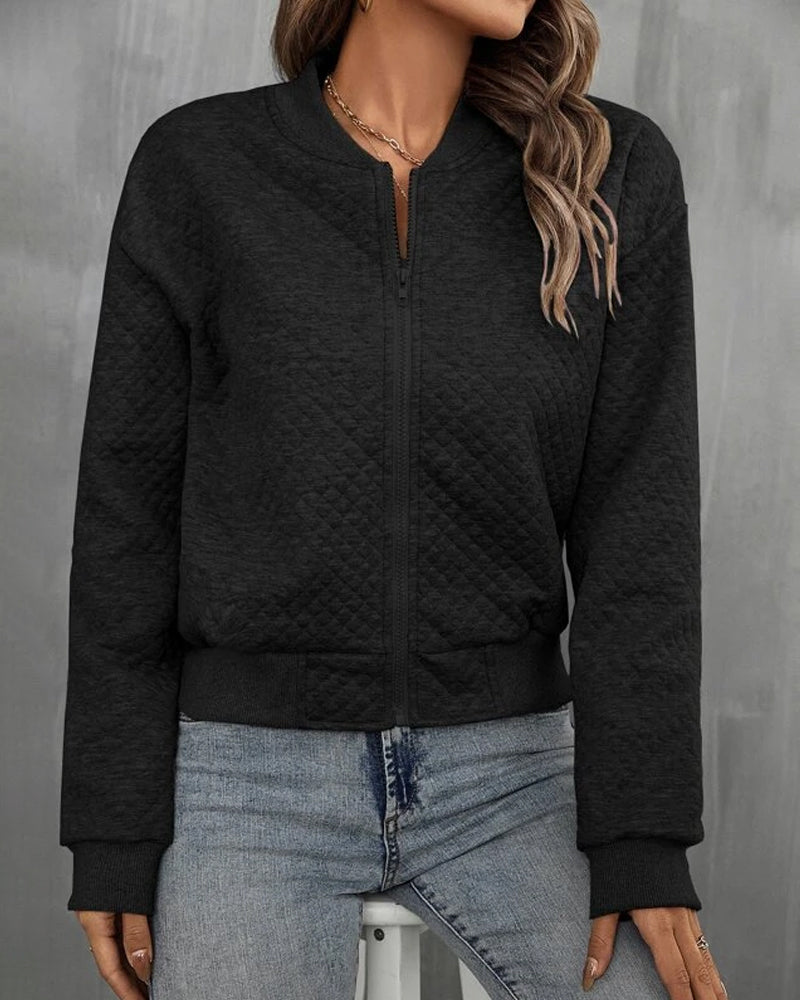 Women's cropped quilted jacket with structured silhouette and front zipper