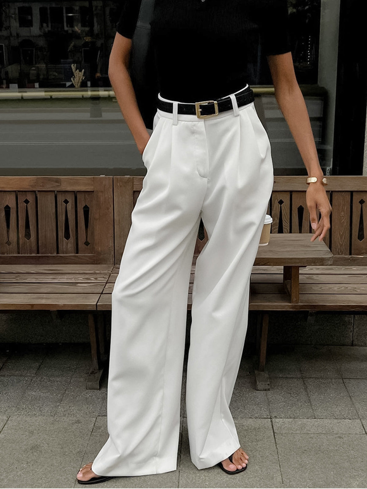 High-waisted wide-leg trousers for women, three-quarter front angle