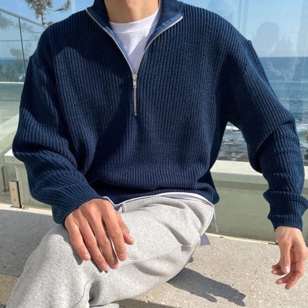 Men's knitted half-zip sweater in beige with stand-up collar and ribbed finish, front view