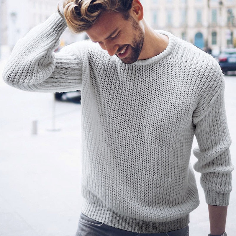 Men's chunky knit sweater with crew neck and ribbed cuffs, front view