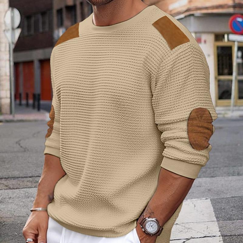 Textured knit men's sweater showing elbow contrast panel and relaxed regular fit