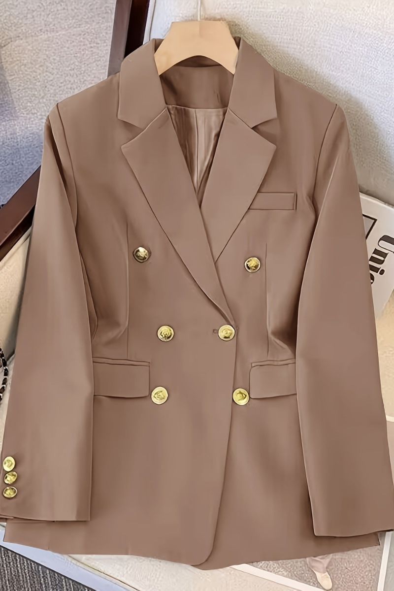Double-breasted blazer for women, side profile showing clean lapel and smooth lining