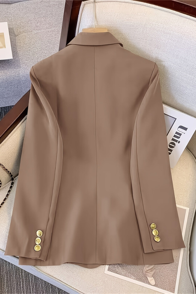 Women's tailored blazer with double-breasted closure, three-quarter angle view