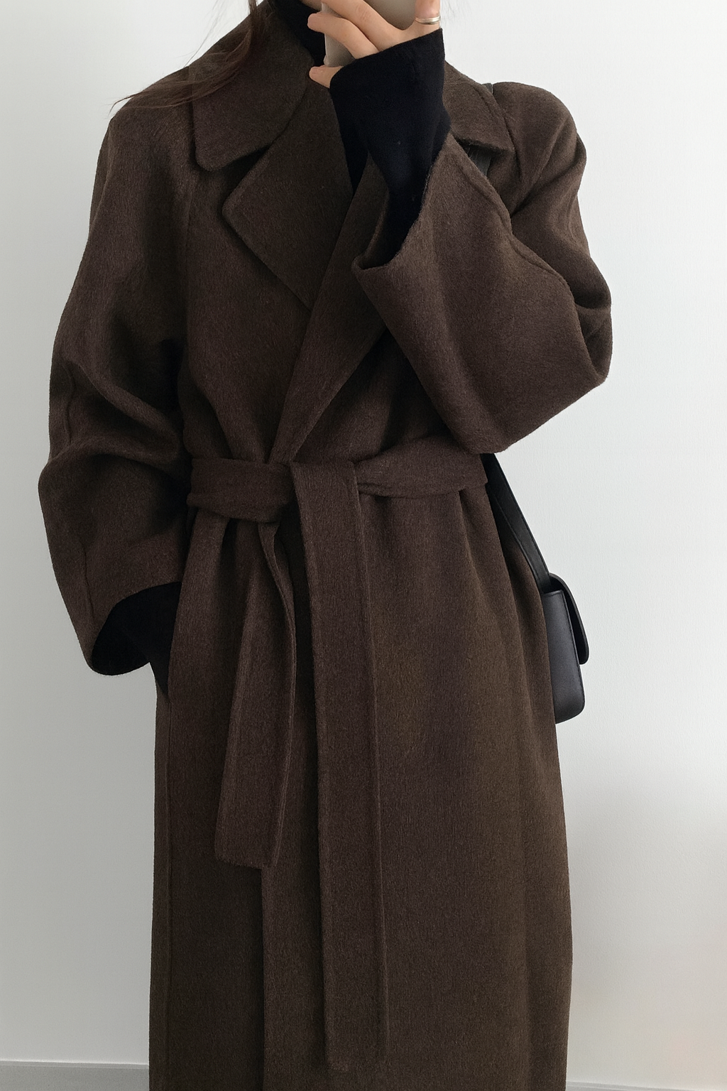 Women's long polyester coat with waist belt and classic lapel collar