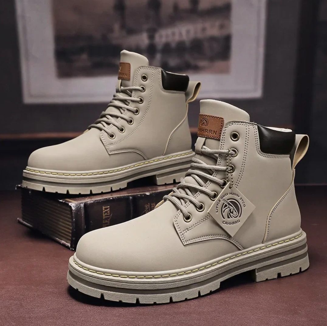 Men's lace-up boots — full front view showing high-top silhouette and lace closure