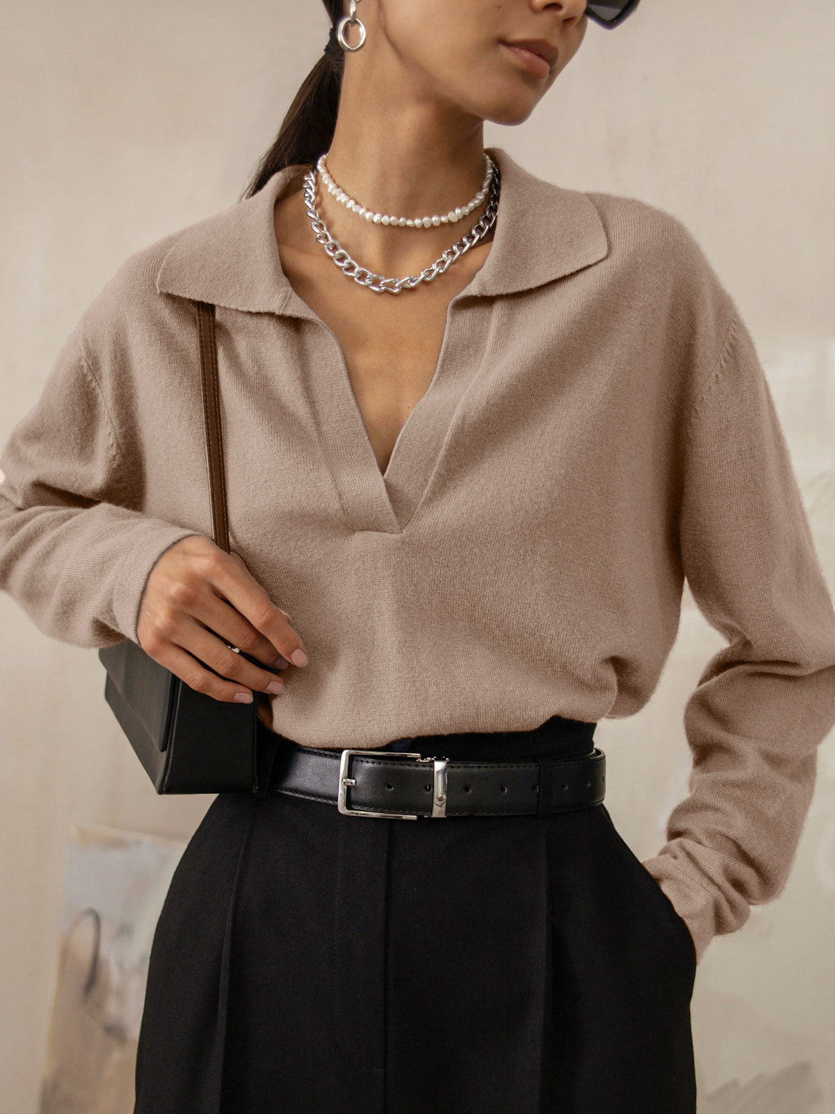 Women's knitted top with V-neck, soft collar, and long sleeves
