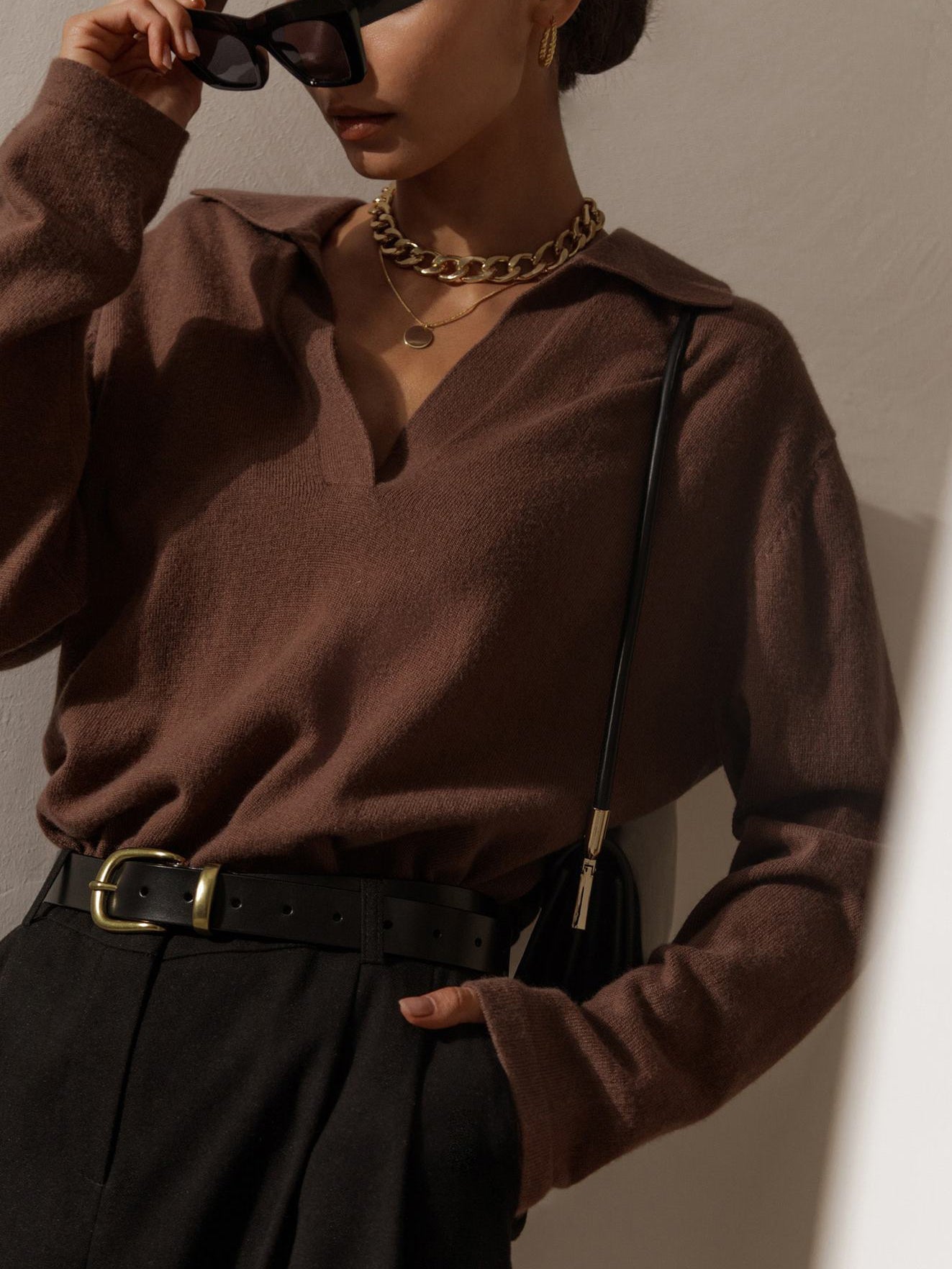 Women's knitted sweater top with V-neckline, collar, and long sleeves