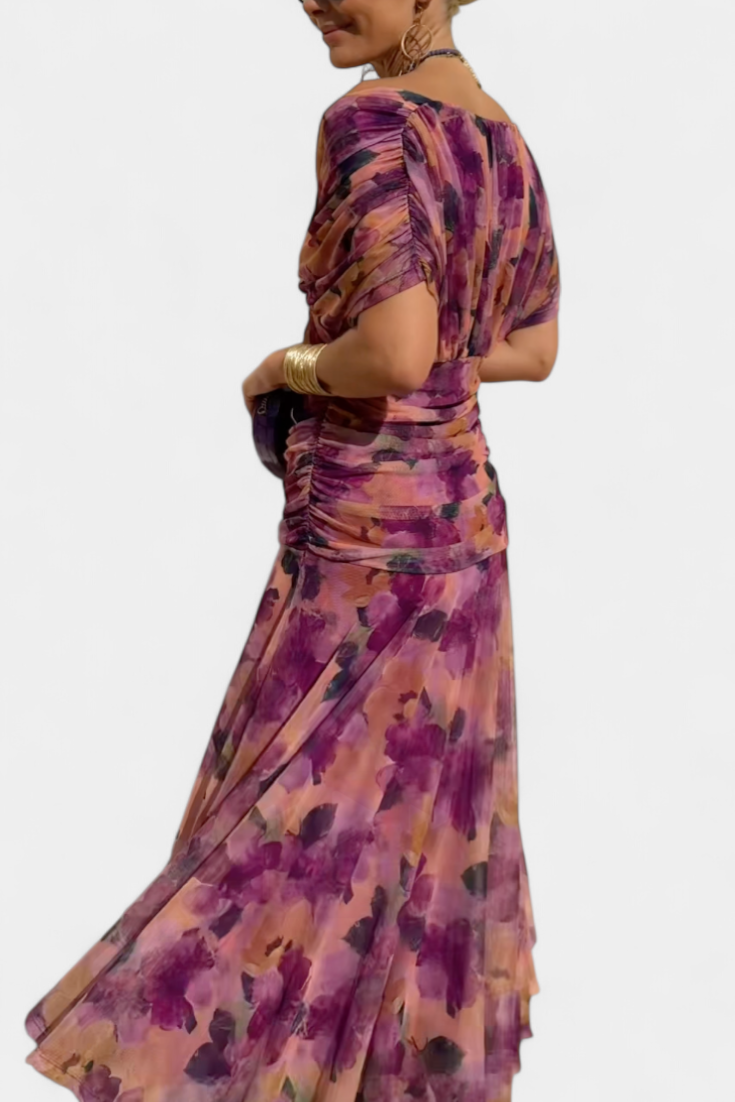 Women's off-shoulder maxi dress with draped bodice and flowing spring silhouette