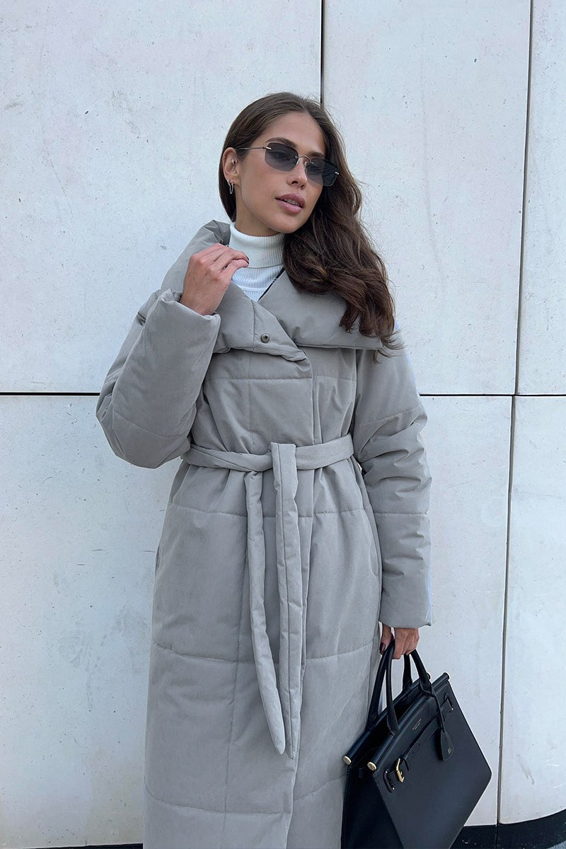 Women's long padded coat with wide collar and side pockets