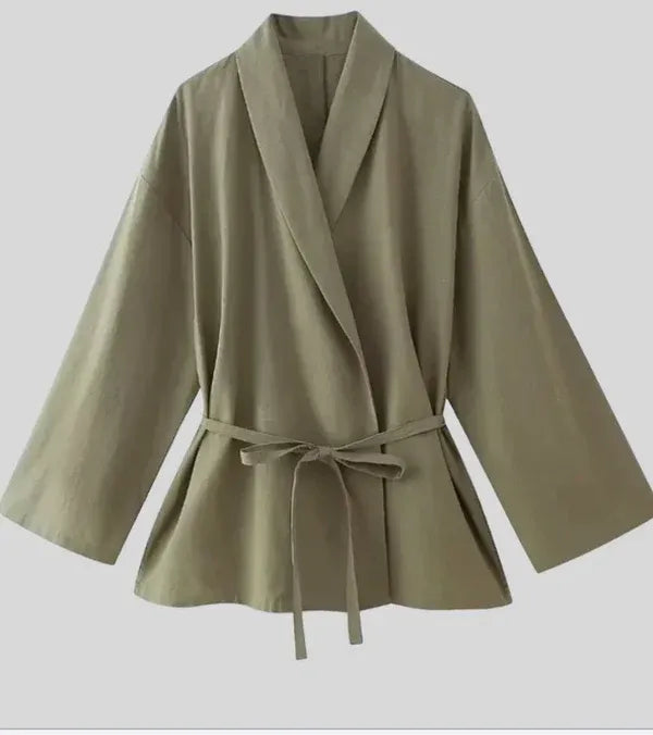 Women's matching set with draped wrap blouse and wide-leg trousers in a soft woven fabric