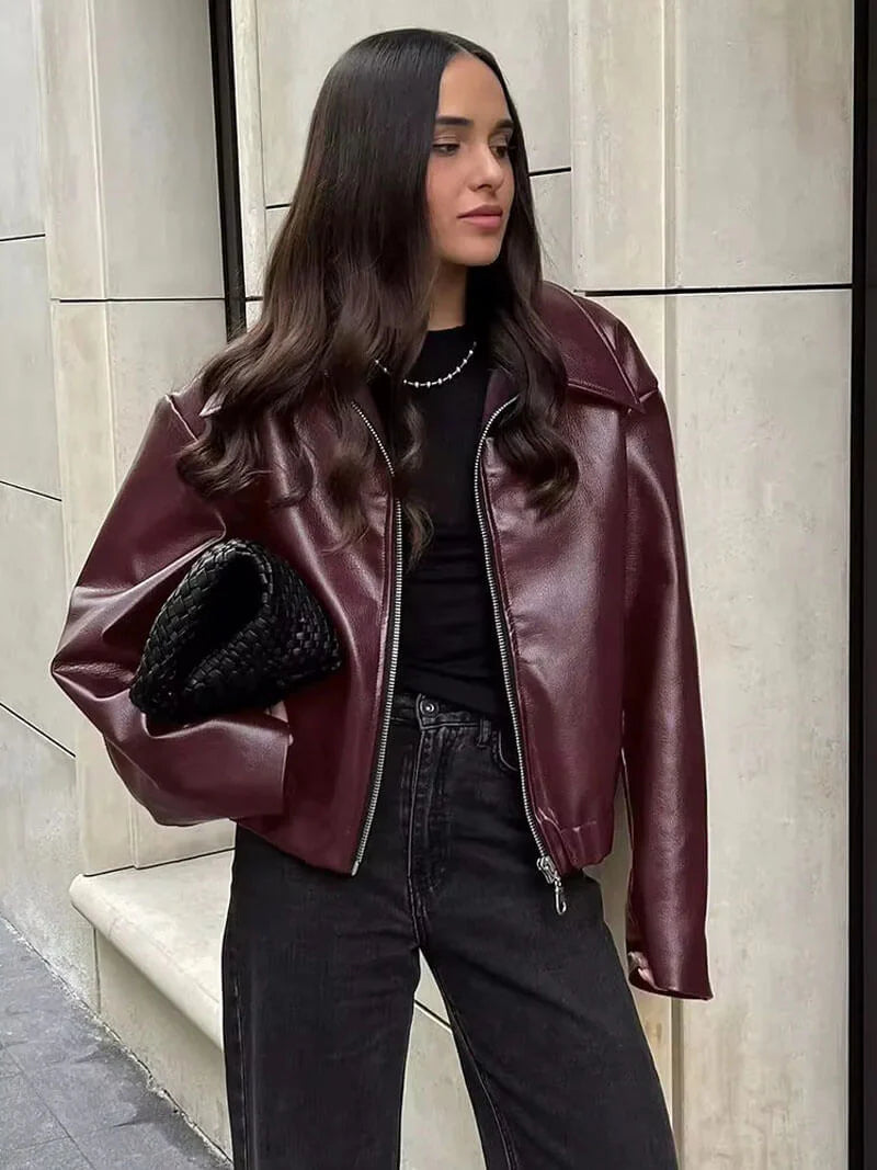 Women's faux leather jacket with front zipper and classic pointed collar