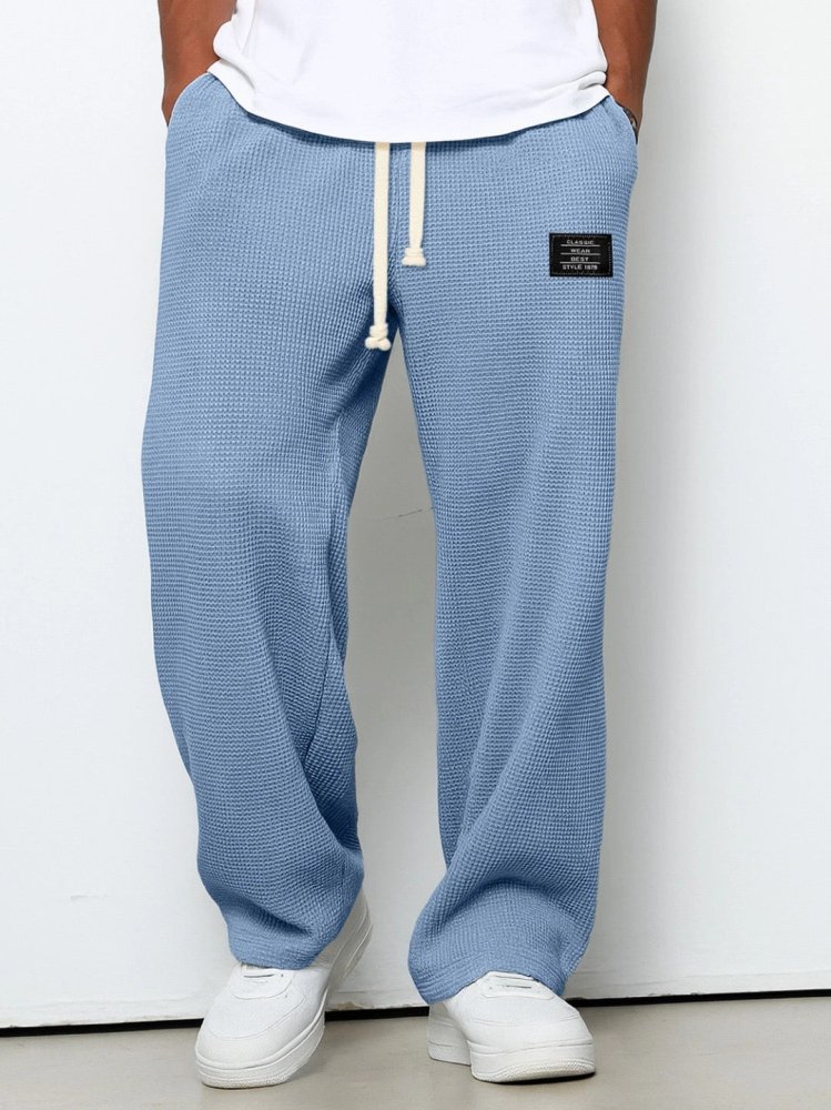 Men's waffle-knit trousers with relaxed fit and elastic drawstring waistband