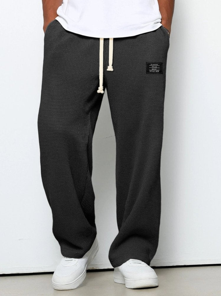 Men's everyday waffle-knit trousers with drawstring waistband and full-length cut