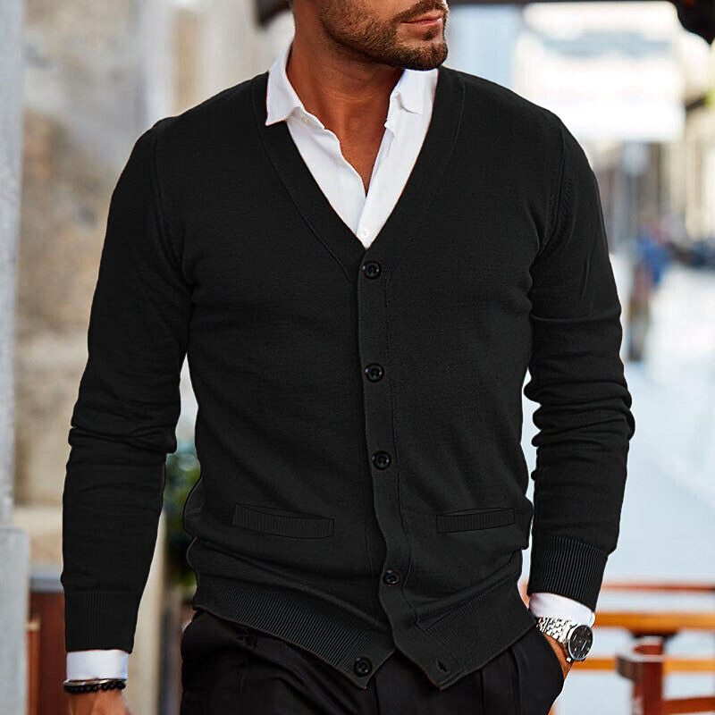 Men's button-up cardigan in dark navy styled casually, full-length lifestyle shot