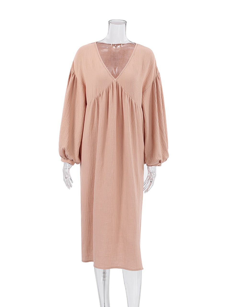 Women's flowing V-neck midi dress with long sleeves and a relaxed pullover construction