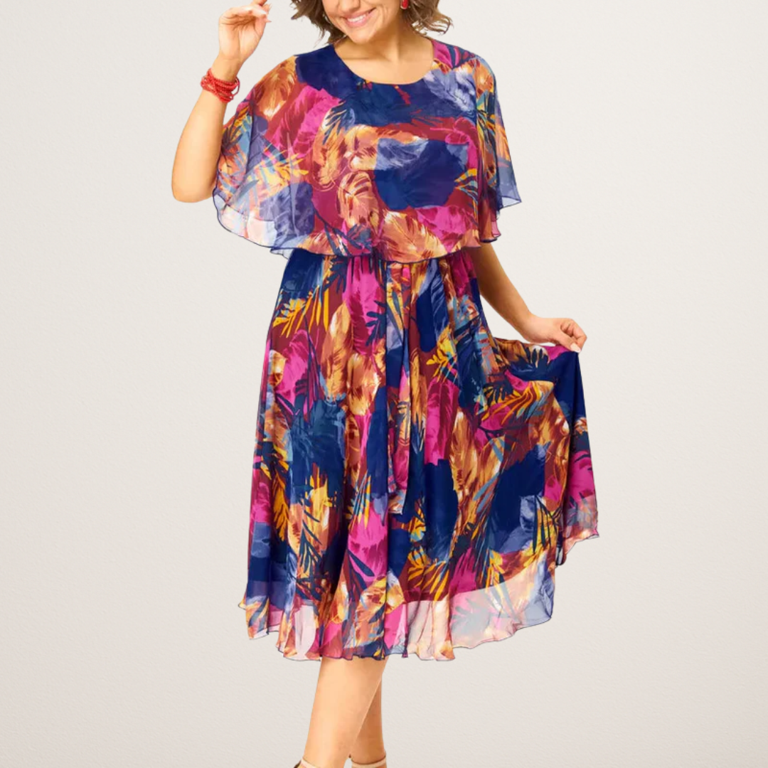 Lightweight chiffon dress with multicolored pattern and flowing midi skirt