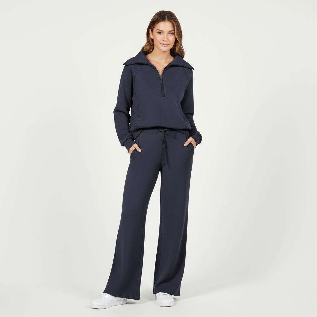 Close-up of women's knit loungewear set showing half-zip closure and stand-up collar detail