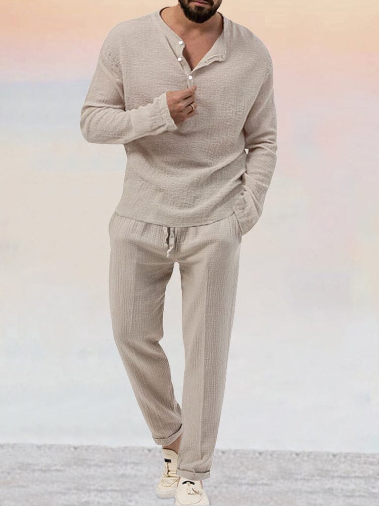 Men's textured lounge set featuring a button-front Henley top and relaxed-fit drawstring pants, styled full-body shot