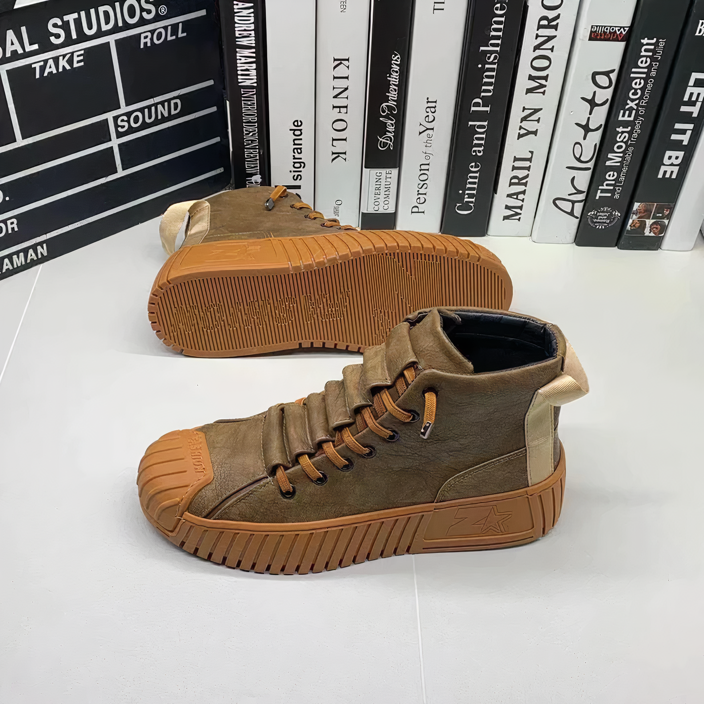 High-top men's sneakers with structured rubber sole and pull tab at the heel