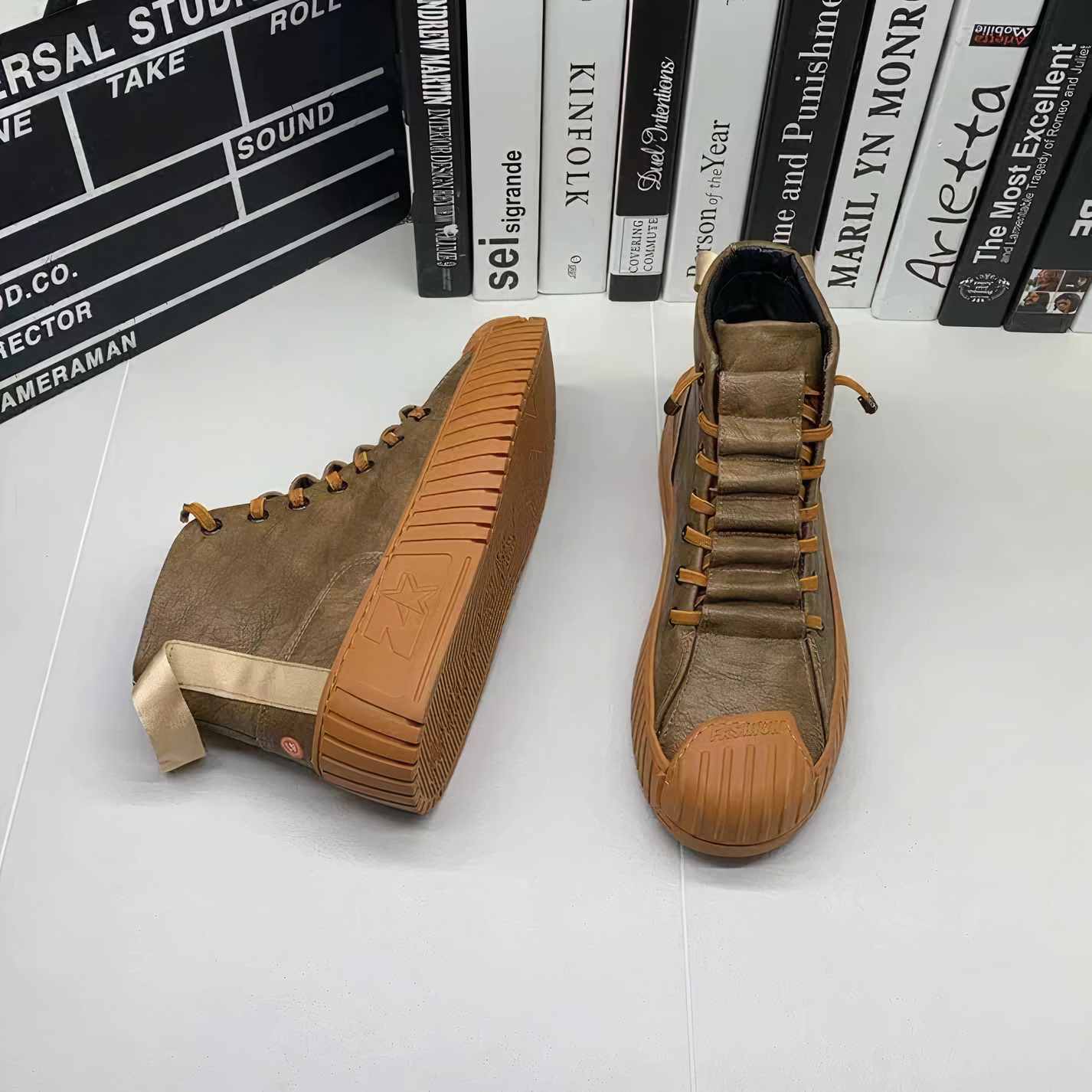 Men's high-top sneakers featuring padded collar, lacing system, and reinforced toe cap