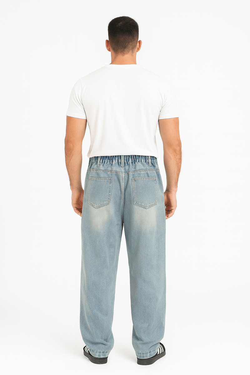 Wide-leg men's jeans featuring visible panel seams and relaxed fit through the leg