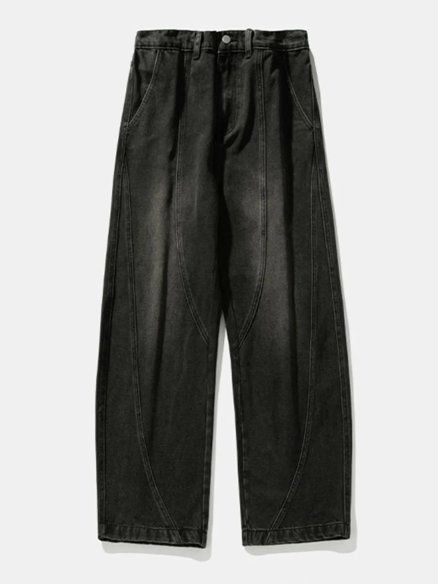 Men's panel jeans with wide-leg cut and washed denim texture, full-length styling