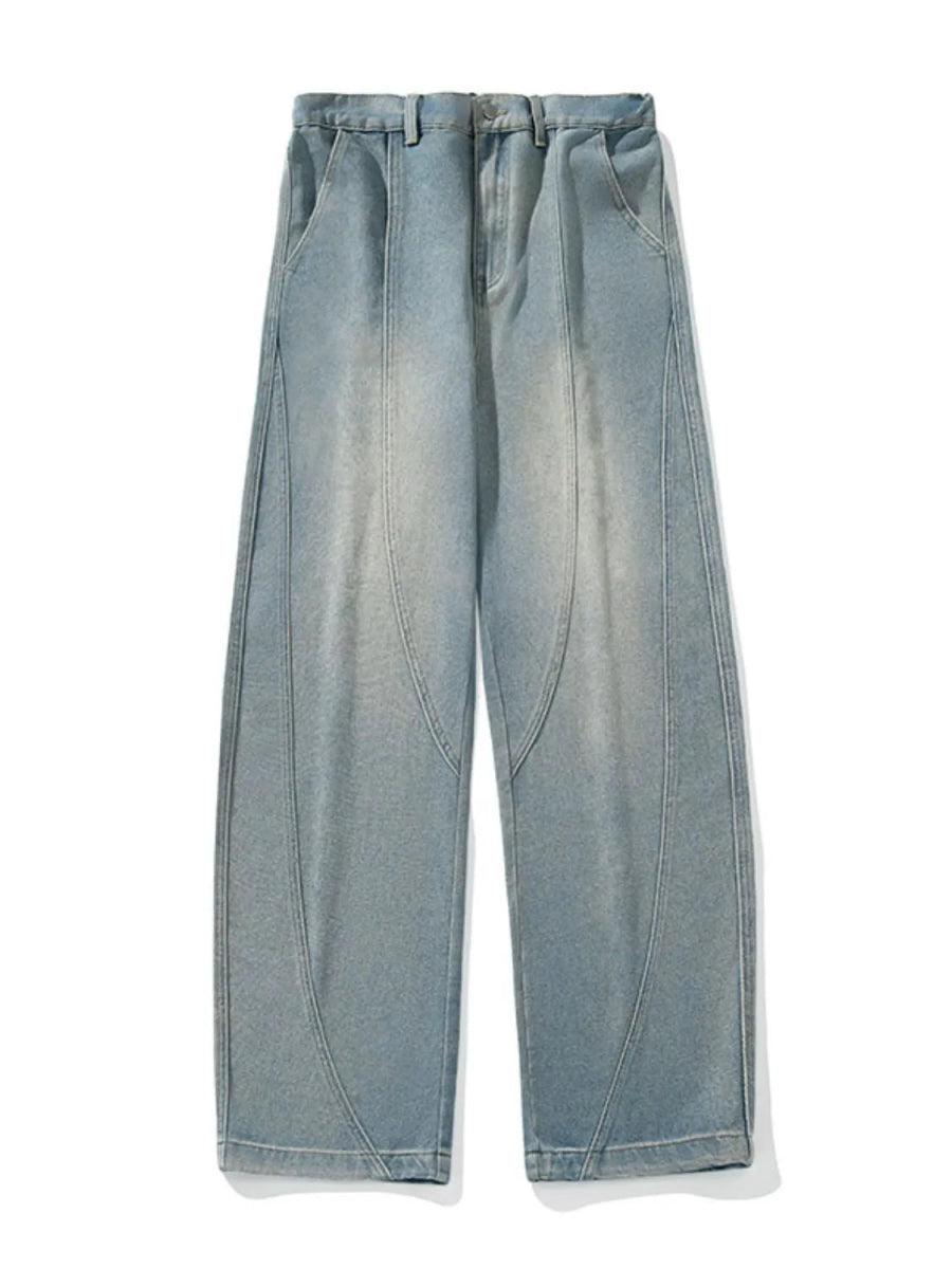 Men's wide-leg denim jeans with relaxed fit and visible front panel construction