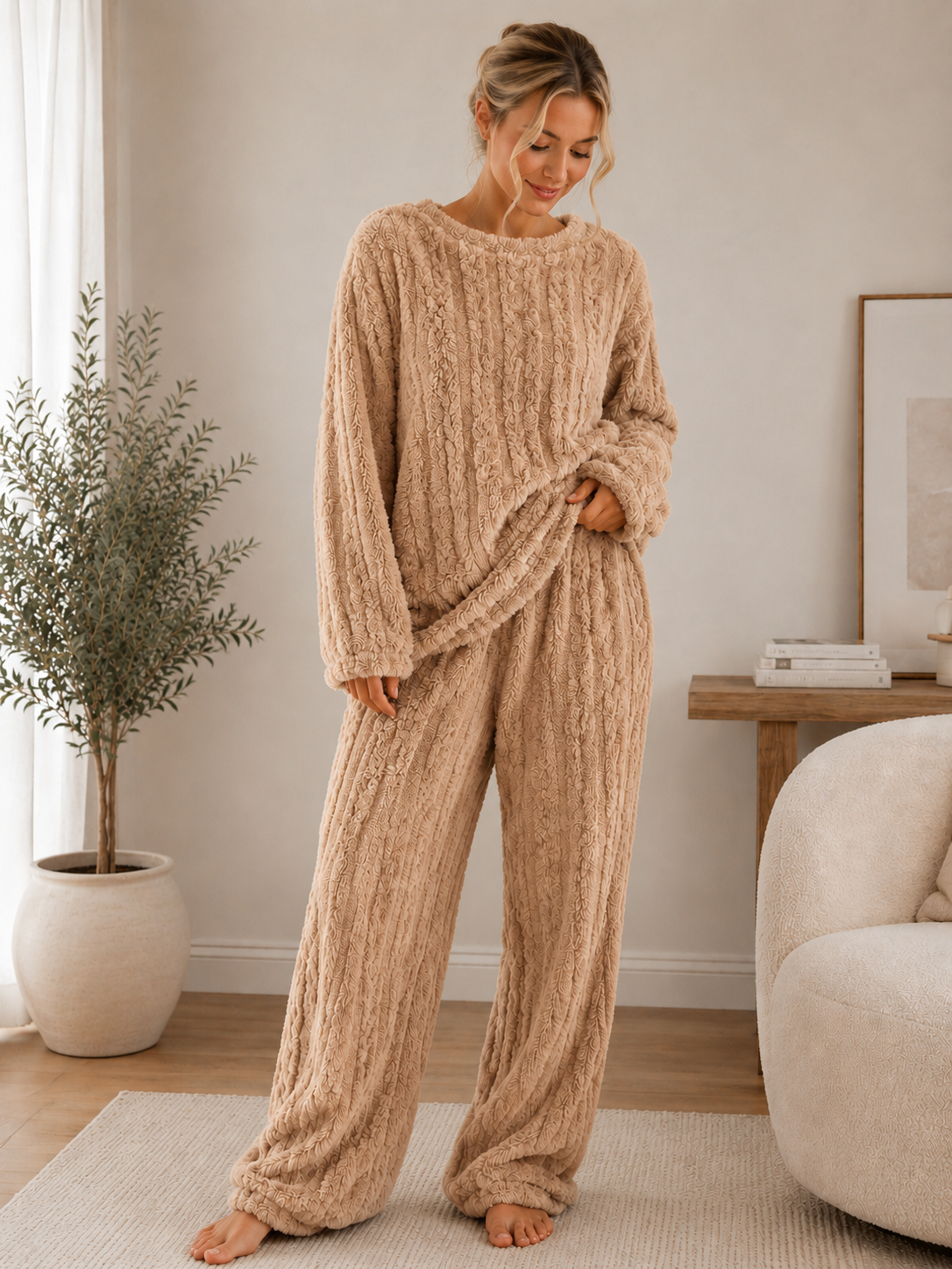 Women's soft fleece lounge set with a long-sleeved round-neck top and coordinating lounge trousers