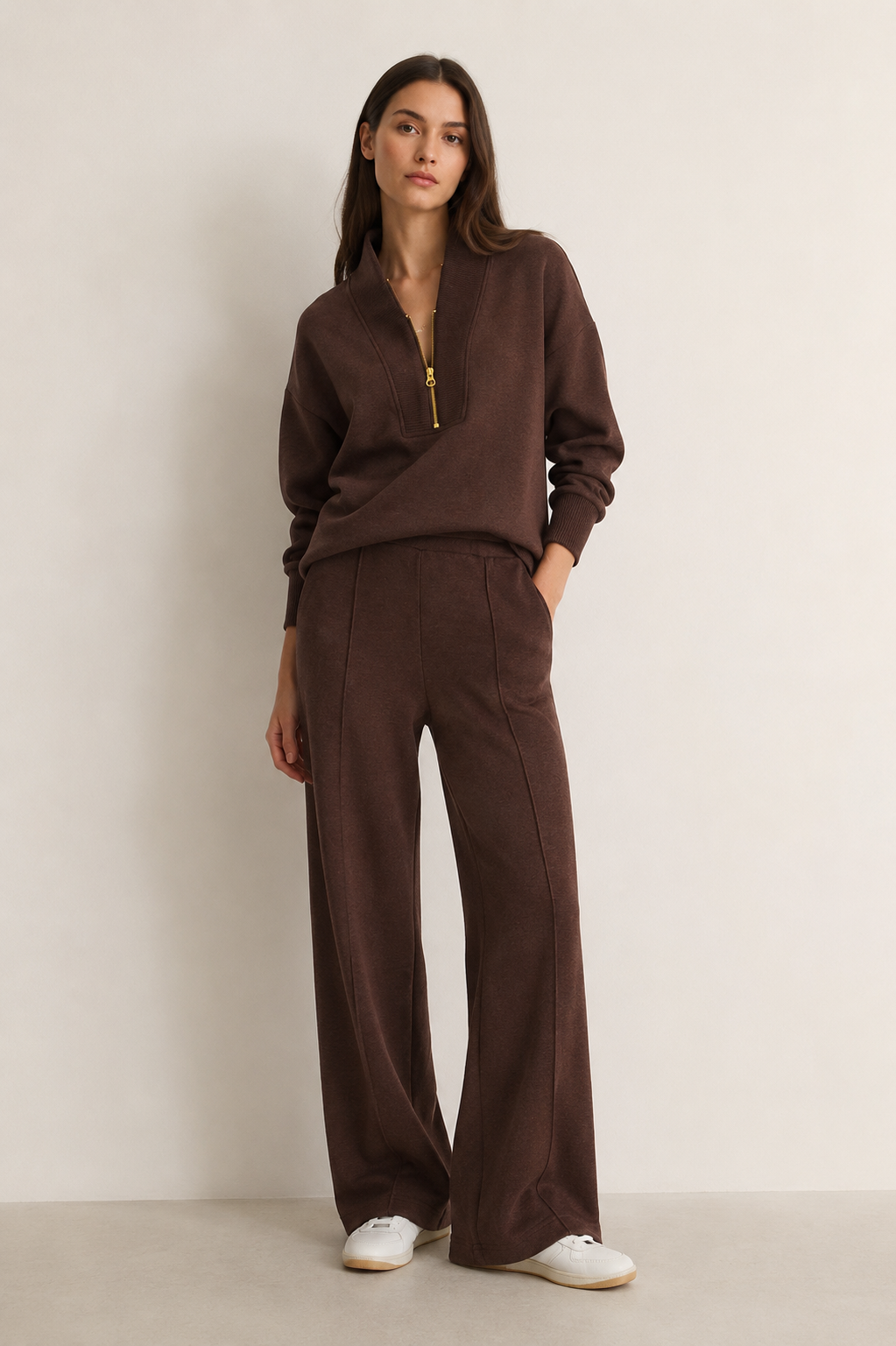 Women's knitted lounge set with zip neck top and wide-leg trousers in a relaxed fit