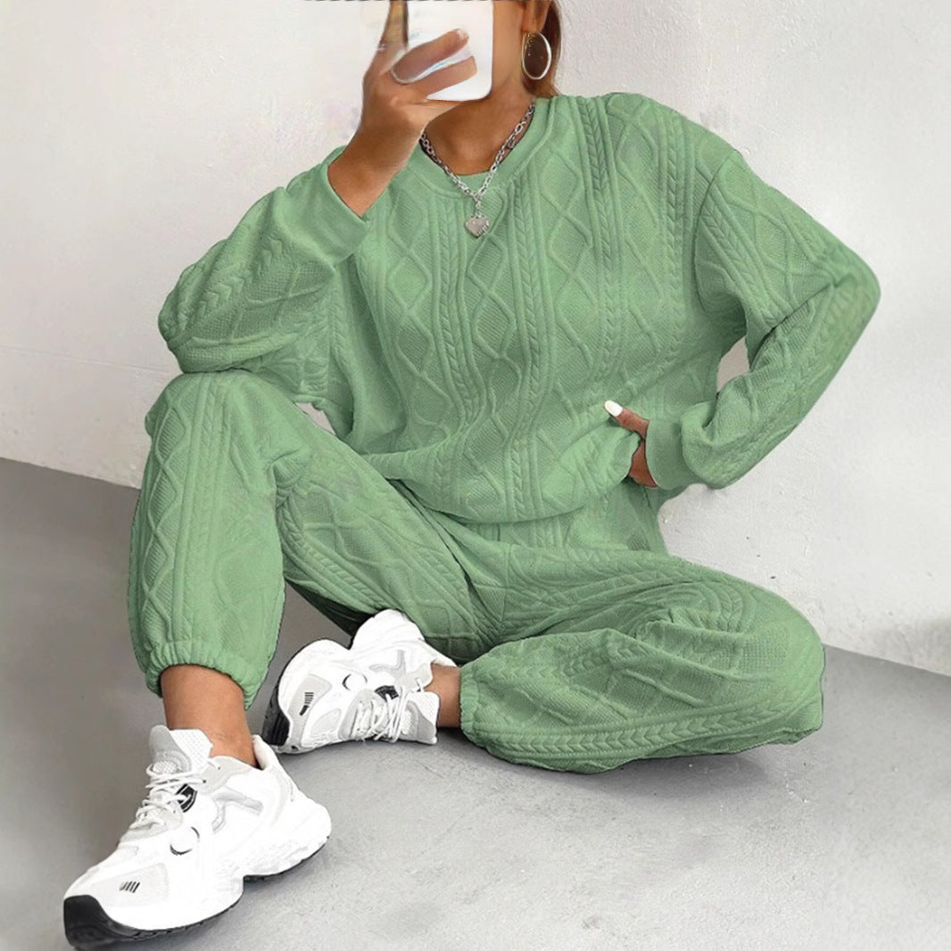 Women's two-piece knitted set with cable-knit detail, elastic waist pants and long-sleeve top