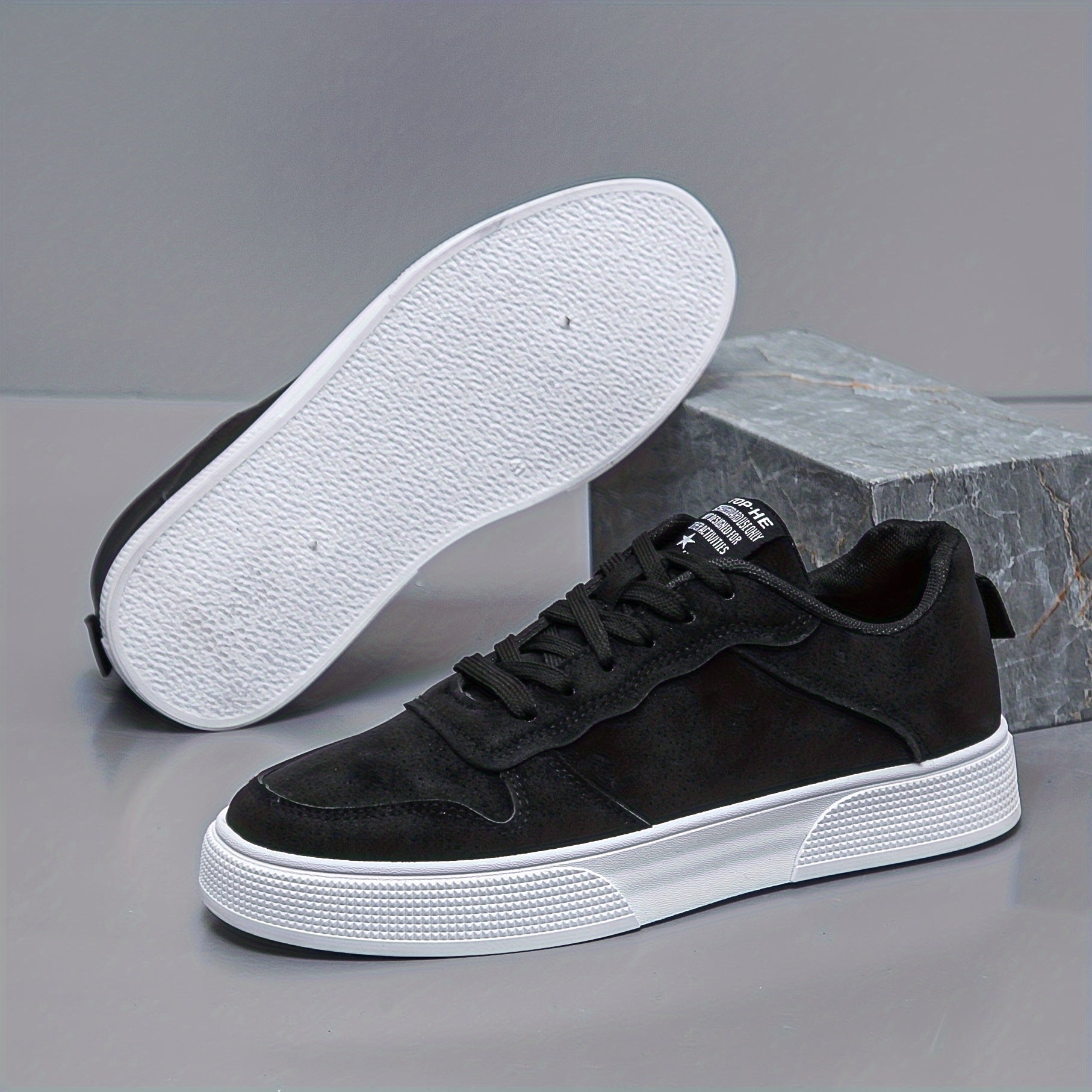 Rear view of men's canvas sneakers showing padded collar and heel construction