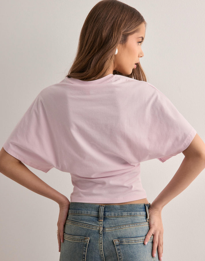 Women's fitted draped top with soft stretch fabric and clean finish