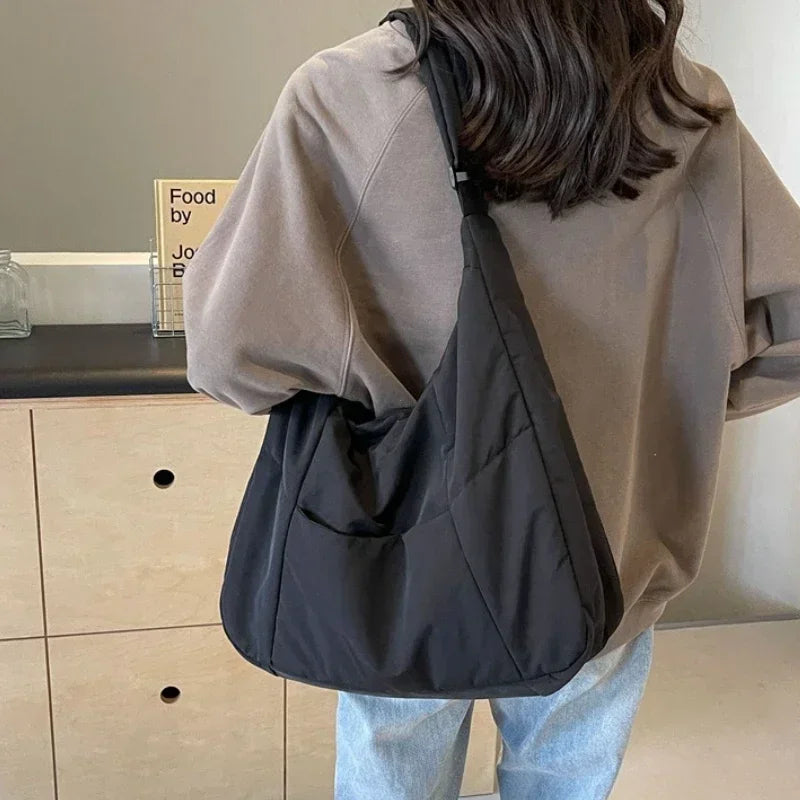 Lightweight quilted shoulder bag shown from the front