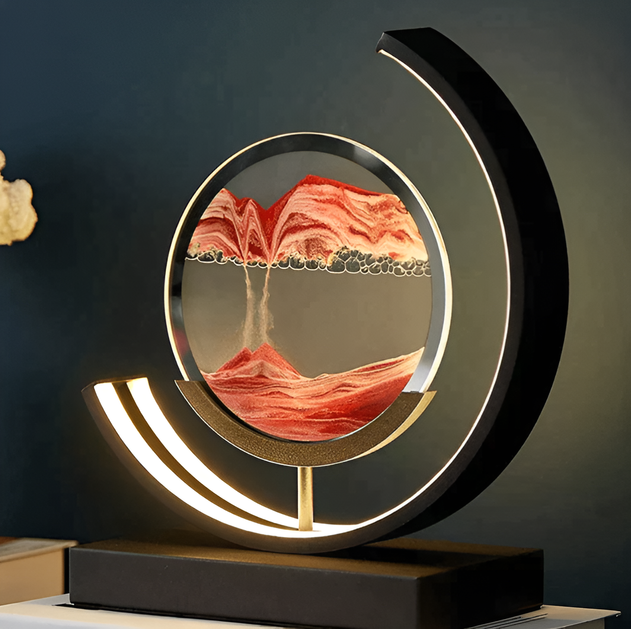 LED decorative sand art lamp with glowing ambient light on a table