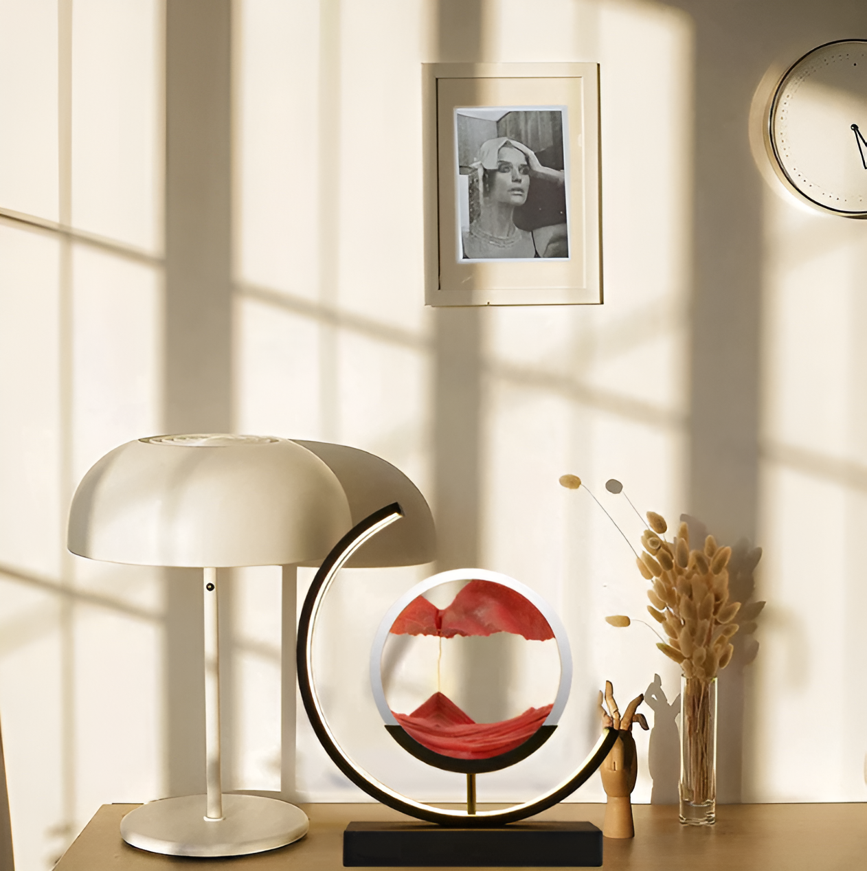 Decorative sand art lamp with metal frame and glass panel displaying sand art