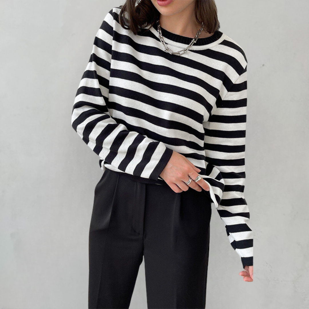 Women's knit top with horizontal stripes, long sleeves, and a straight hem