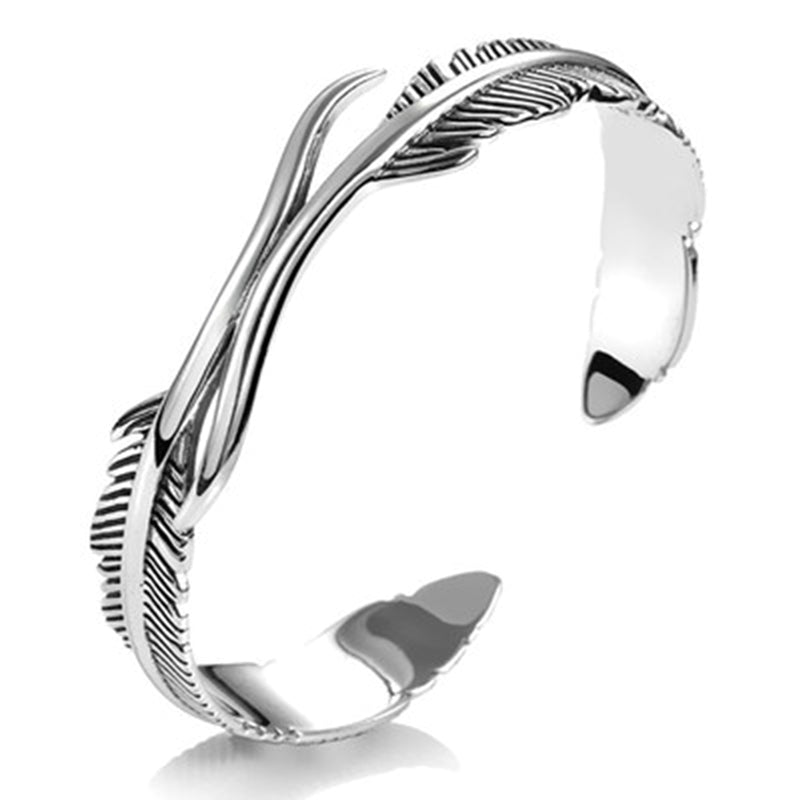 Unisex feather bracelet with open cuff design, front view