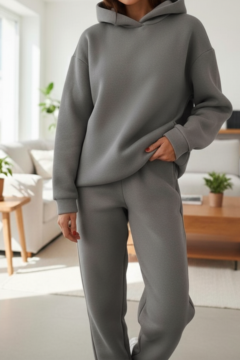 Women's matching hoodie and jogger set in knitted fabric, three-quarter back angle full-body
