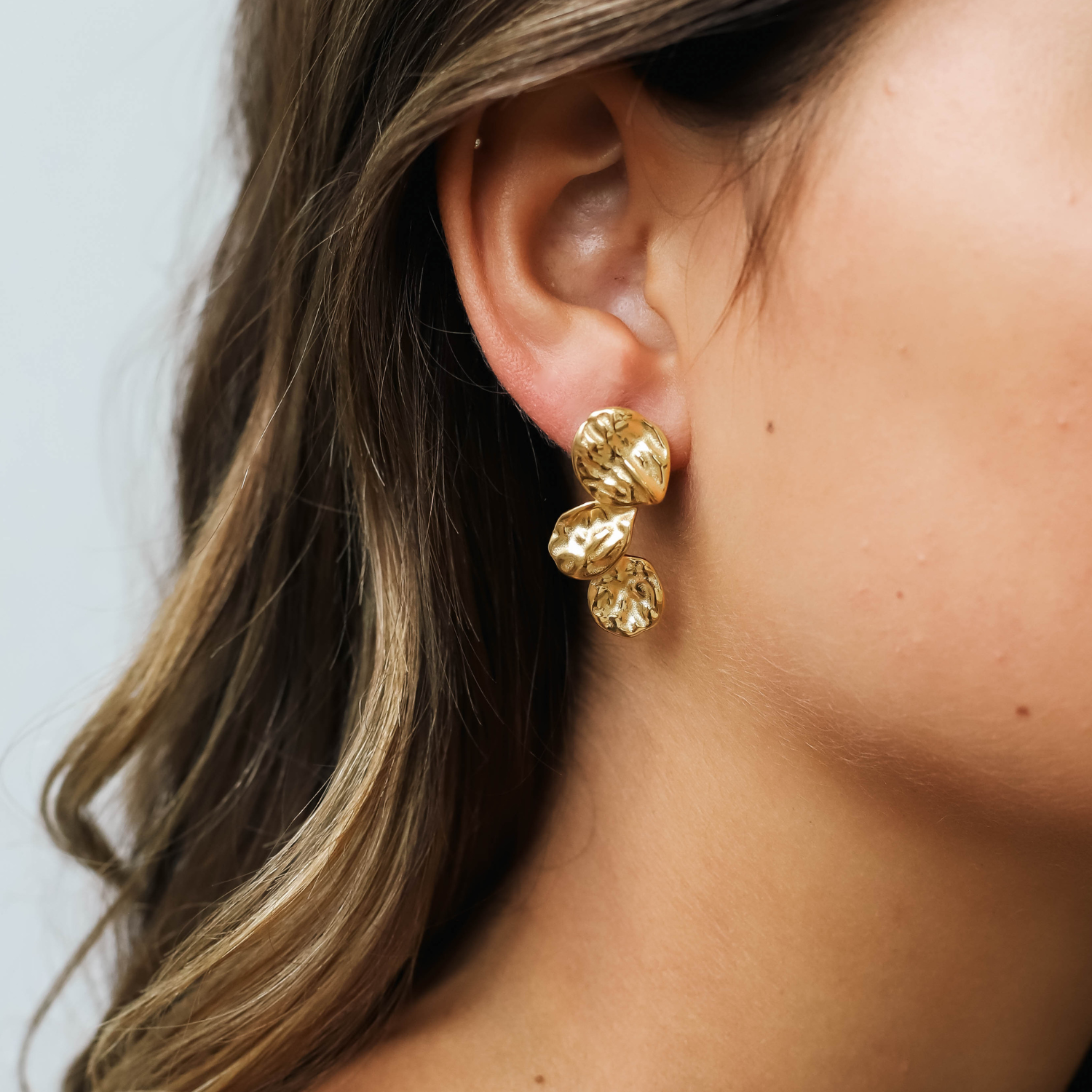 Gold textured drop earrings for women