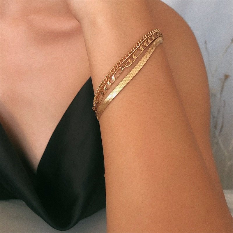 Adjustable metal arm cuff with open-ended layered chain construction