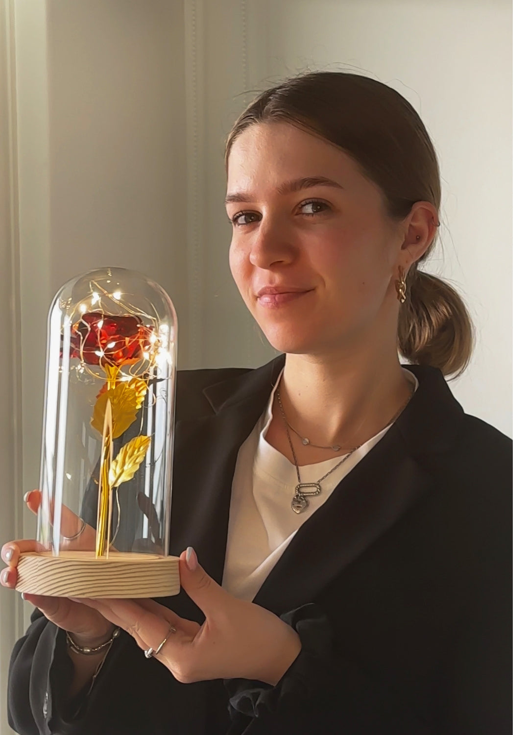 LED flower inside glass dome centerpiece styled on a table as decorative accent lighting