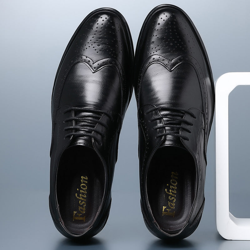 Close-up of brogue perforation pattern on men's genuine leather dress shoes